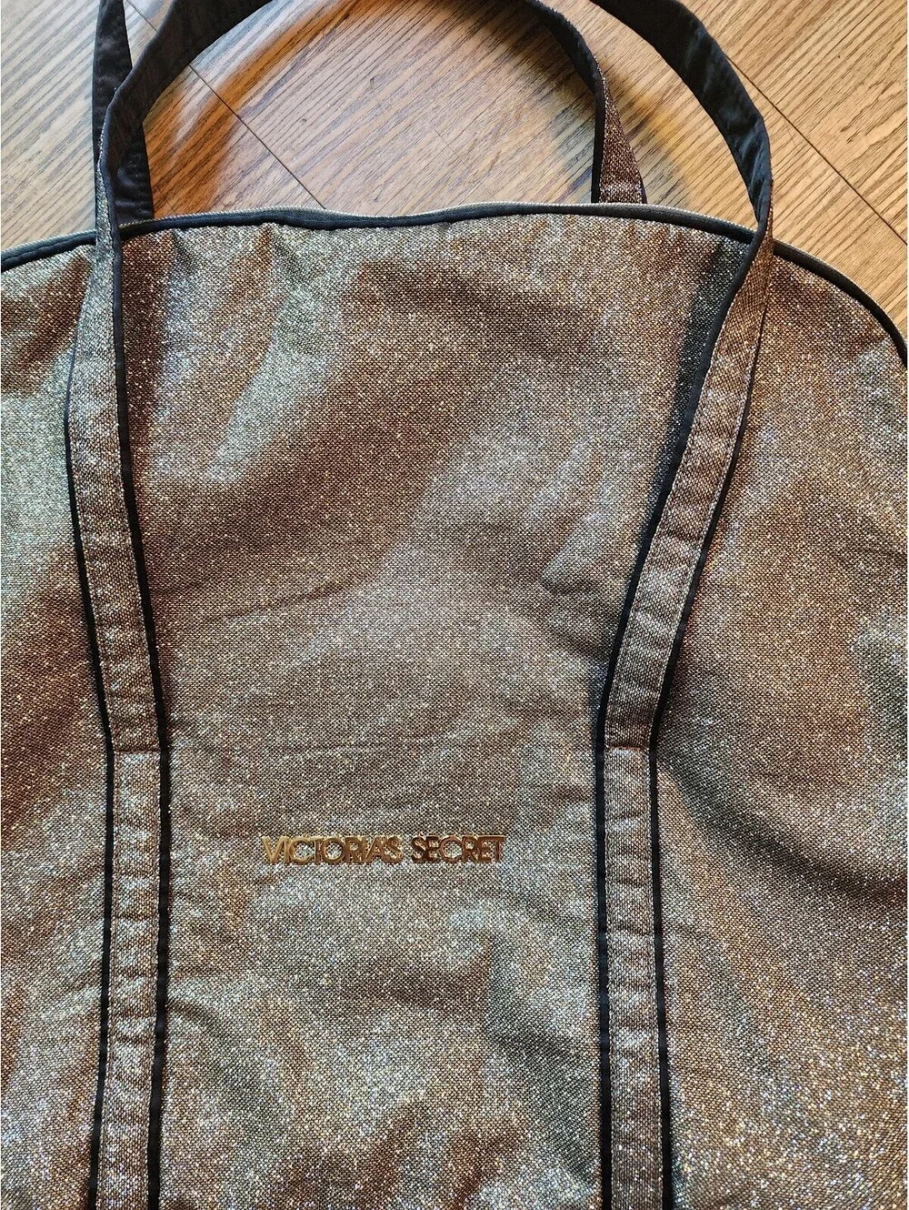 Victoria's Secret Gold Glitter Tote Bag with Black Accents and Dual Handles